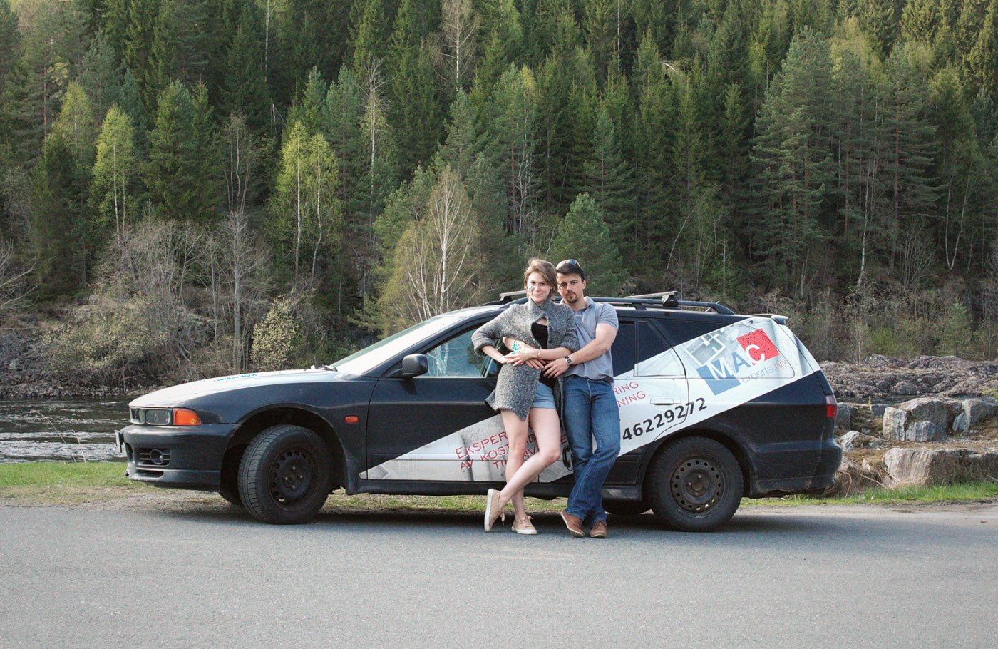 The two of us leaning on the work car, out between jobs